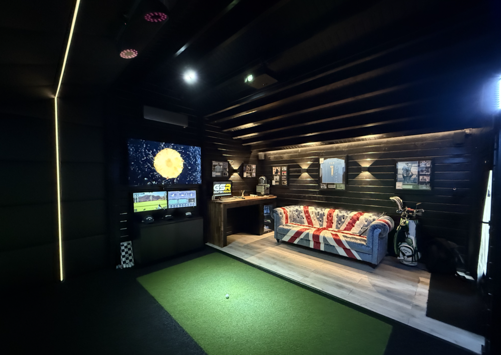 Tekden The Legend Golf Simulator Room from the back of room with Sofa from side